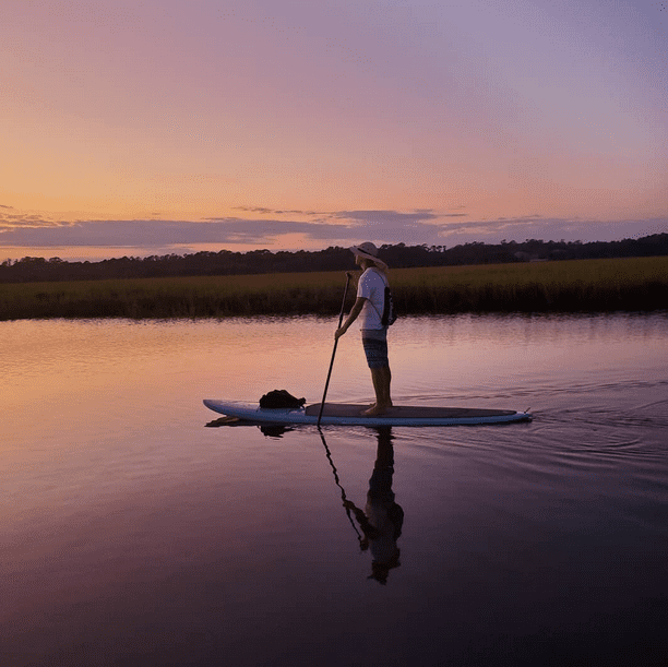 Paddleboarding SUP by sunset